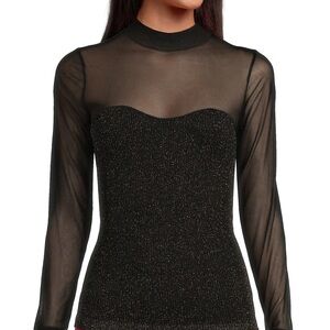 A loves a sparkle and sheer top